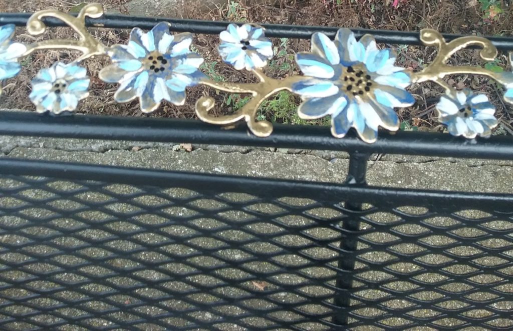 close up of detail on wrought iron settee