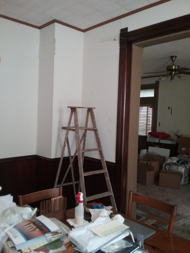 Corner of dining room after wall paper removed