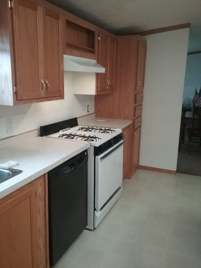 kitchen area over stove after paper removed