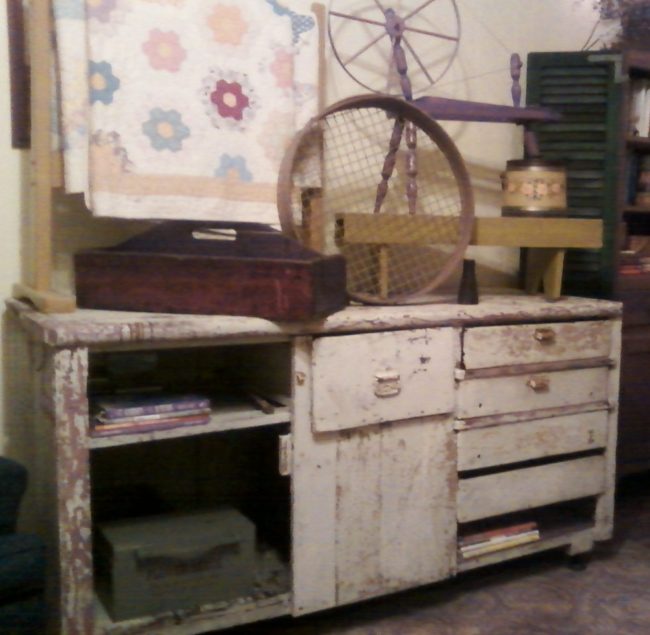 Primitive cabinet displayed for Fall