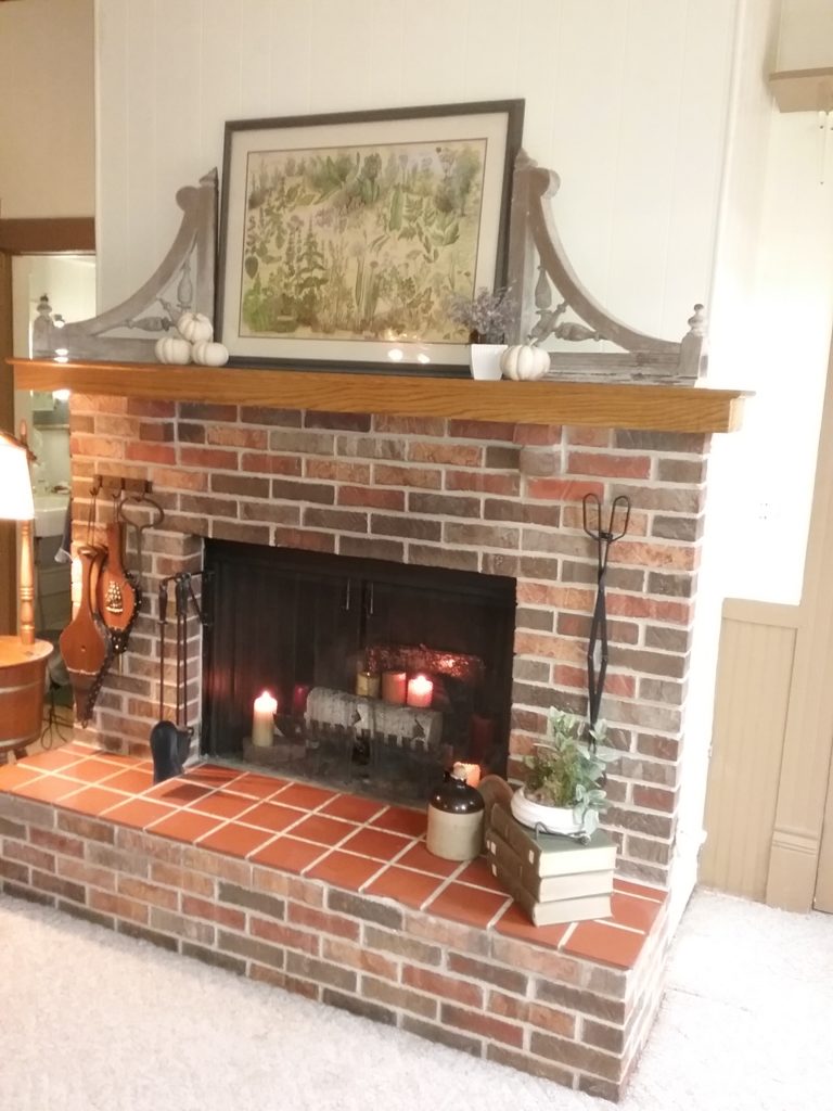 Farmhouse Fireplace Mantel decorated with Architectural salvage