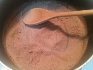 pan with dry ingredients to make chocolate sauce