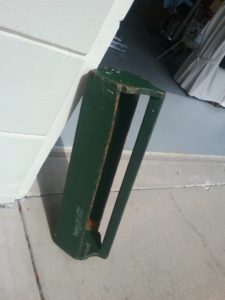 old green wooden tool carrier