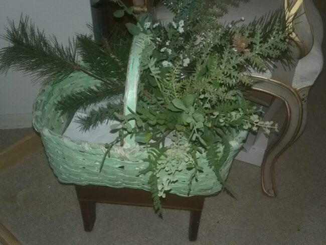 vintage basket with Christmas greenery