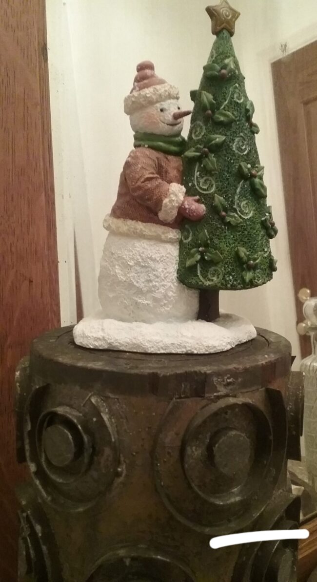 Snowman Bob with Tree setting on wall paper roller