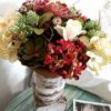 Winter dough bowl arrangement on pedestal