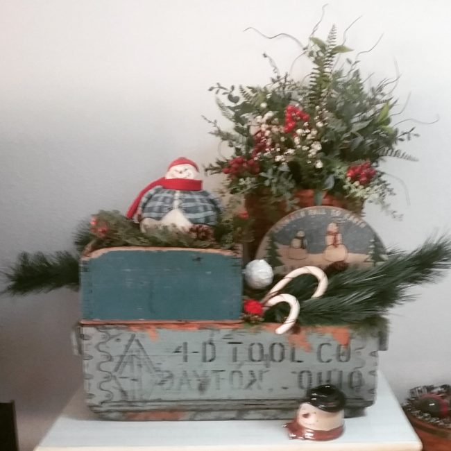 primitive Christmas display with Snowman