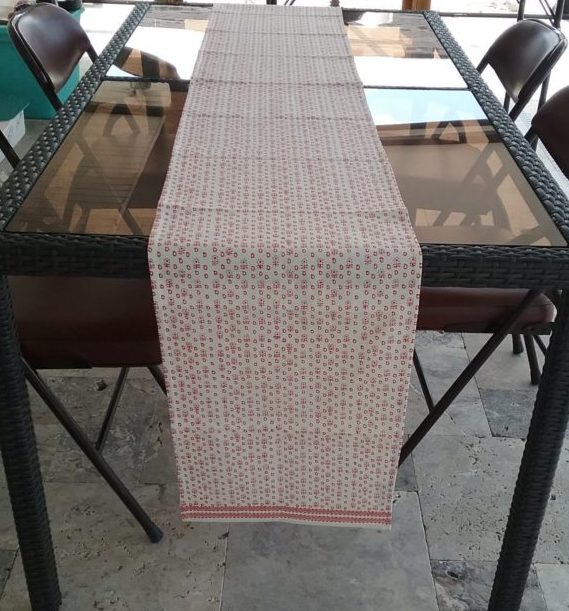 Cream & Red Runner on Outdoor Dining Table