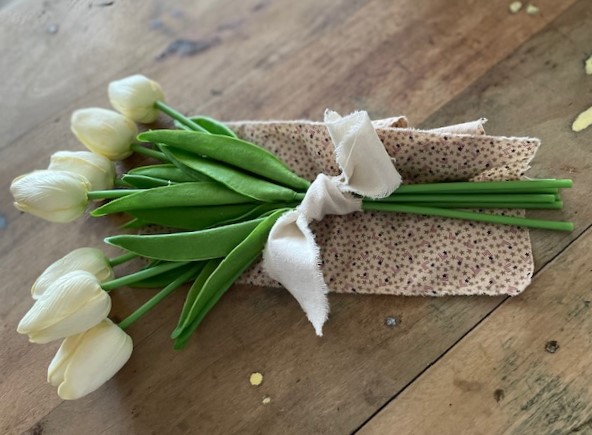 Cream tulips with a simple muslin tie