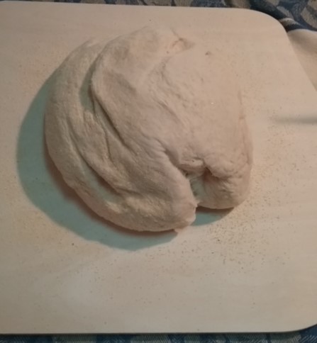 pizza dough on peel