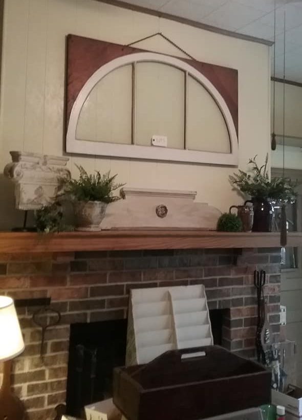 Fireplace mantel styled for summer