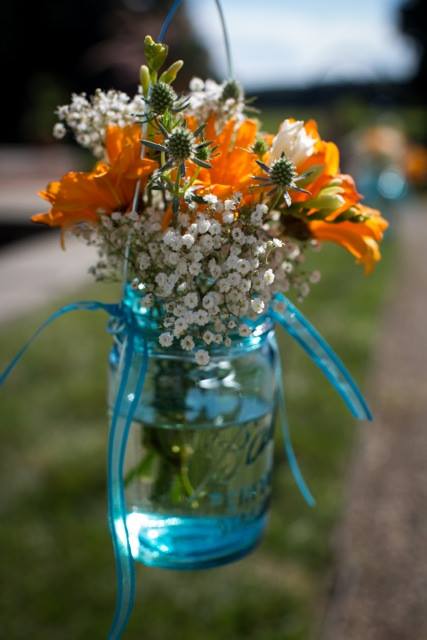 summer flowers in a blue mason jar