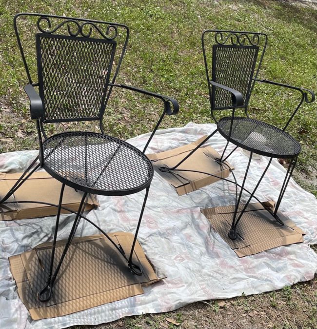 black wrought iron chairs after being repainted