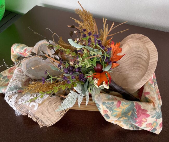 bouquet in wooden tray