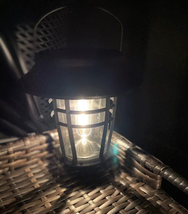 Solar lantern close up at night on lanai