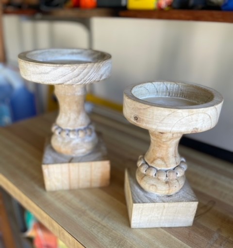 pair of natural colored wooden candleholders