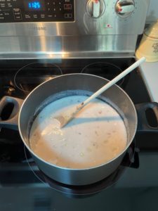 pot of cream base simmering on range