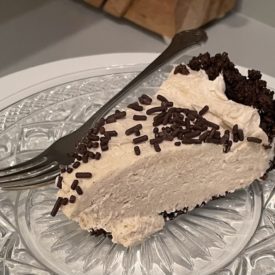slice of no bake cheesecake on plate
