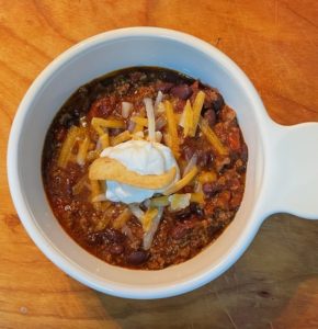 Black bean chili with toppings