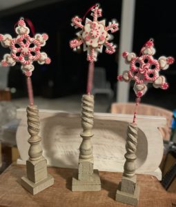 set pf three spindles with snowflake ornaments