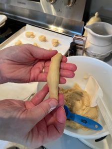 rope of dough ready to shape in a knot
