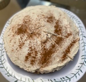 Pumpkin spice cheesecake dusted with cinnamon