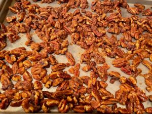 pan of spice coated pecans ready to dry
