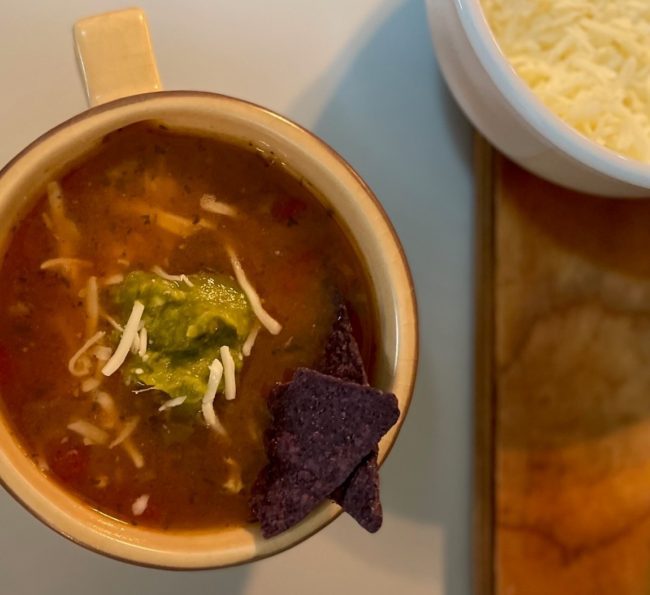 Condiment topped Tortilla Soup