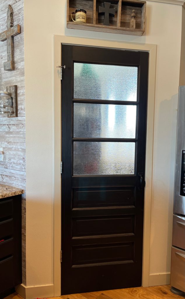 After picture of old door used for a pantry