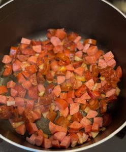 saucepan of diced sausage & onion