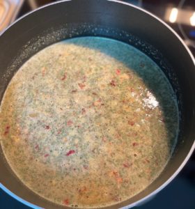 pot of Chicken Chile Verde brought to a boil