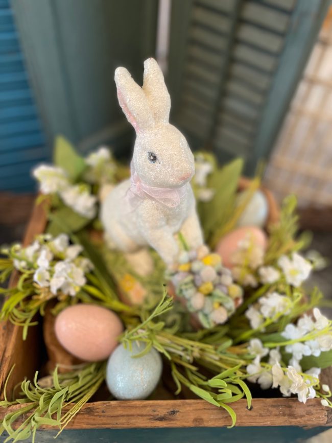 Easter Bunny with eggs in a primitive box