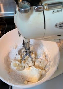 Blending cheesecake mix with softened cream cheese