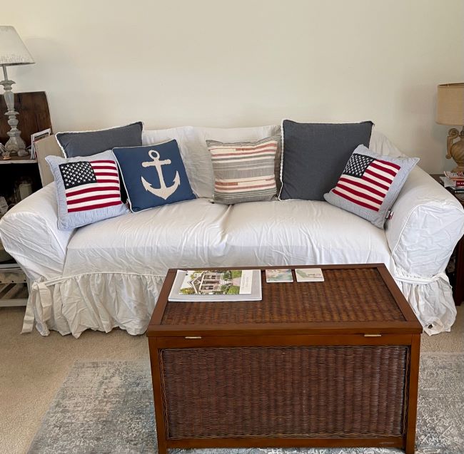 white sofa accented with patriotic pillows