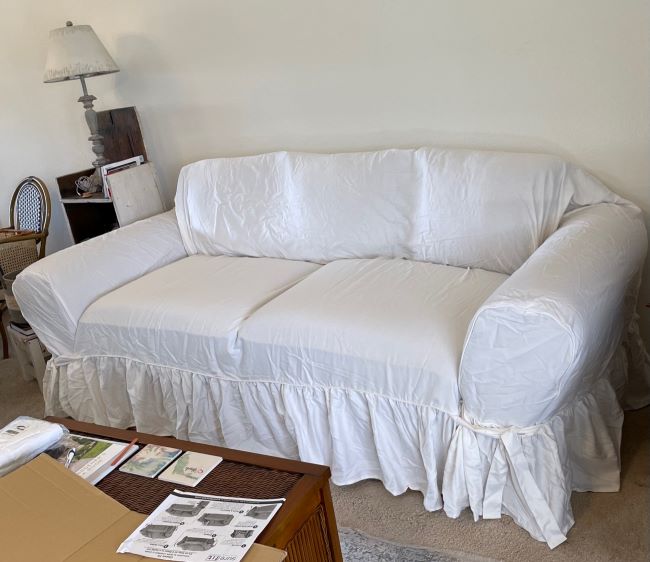 white slipcovered sofa