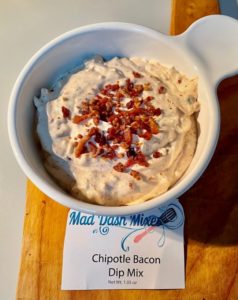 serving dish filled with Chipotle Bacon Dip