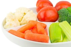 assorted vegetables in a white tray