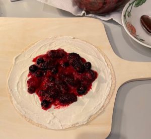 whole wheat tortilla with cheesecake filling and berries