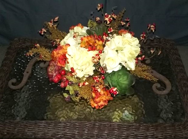 Fall arrangement in a round dough bowl