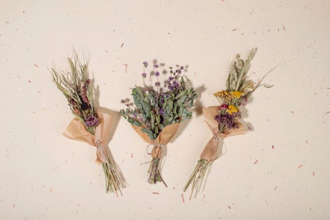 dried herbs & flowers wrapped in kraft paper