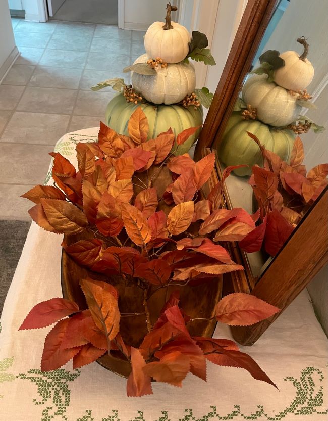 dough bowl with bronze autumn leaves