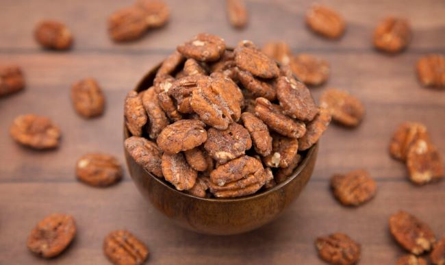 small round bowl of sugared pecans