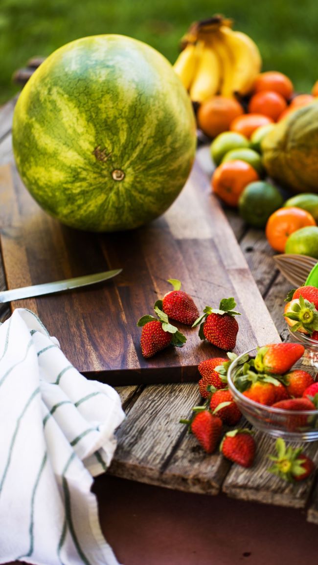 Watermelon & strawberries on a cutting board