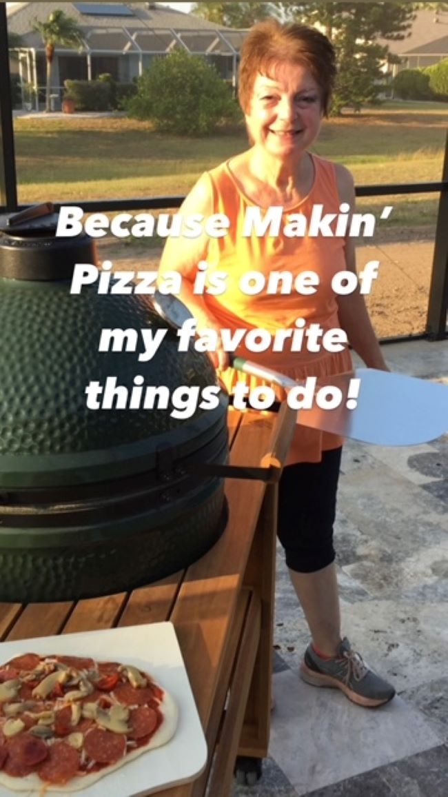 Kimberly making pizza on the Big Green Egg