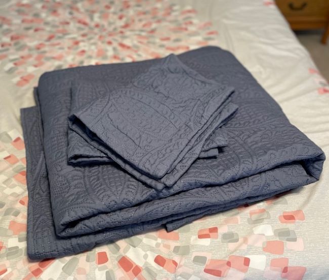 set of 2 blue shams with matching bedspread