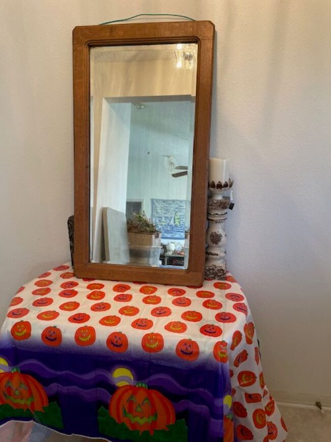 Entryway table with a Halloween tablecloth