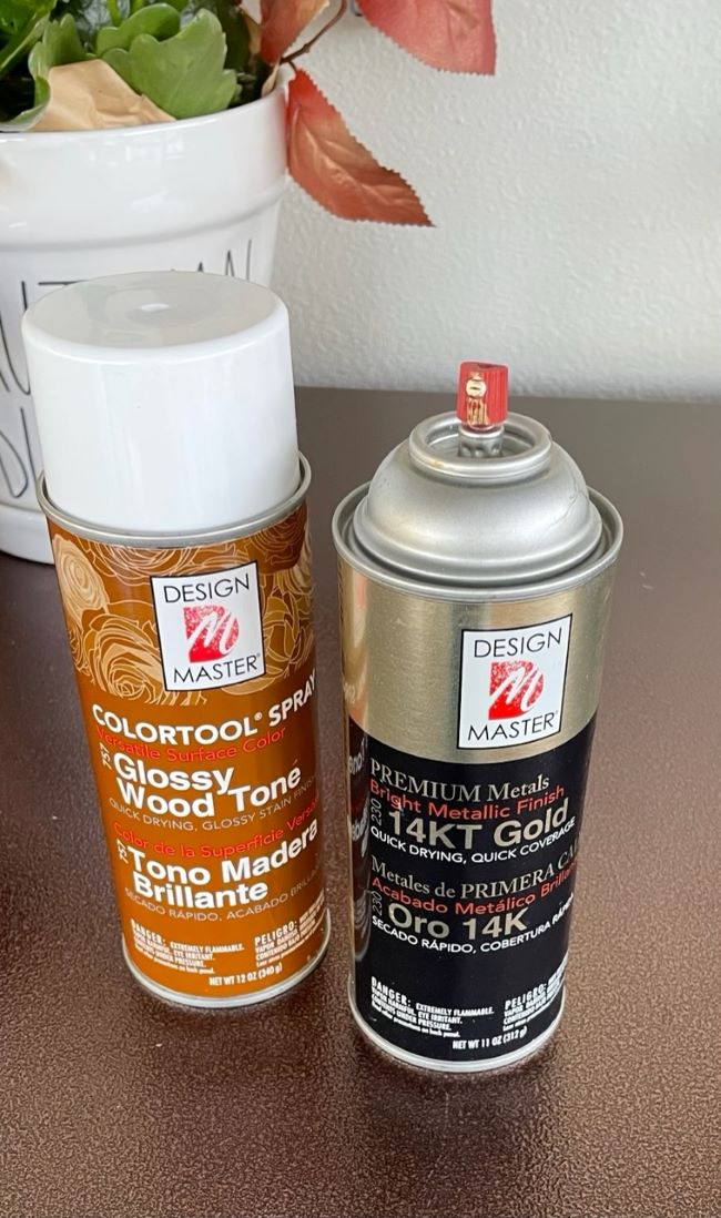 Two cans of spray paint