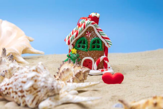 Small gingerbread house on the beach