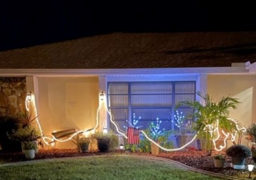 holiday lights decorate the outside of a Florida home