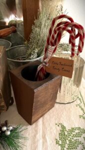 chenille candy canes in a wooden sugar mold